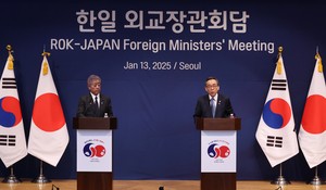 S. Korea, Japan pledge to mark 60 years of ties, unshaken by political crisis