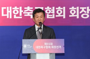 Much-maligned football chief wins new term despite controversy