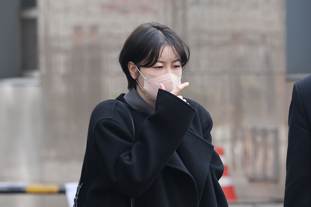 Moon Da-hye, former President Moon Jae-in's daughter leaves the Seoul Western District Court after attending her hearing on charges of violating the Road Traffic Act and the Public Health Control Act on Thursday. Yonhap