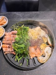 Happy marriage of fresh minari and chewy pork belly