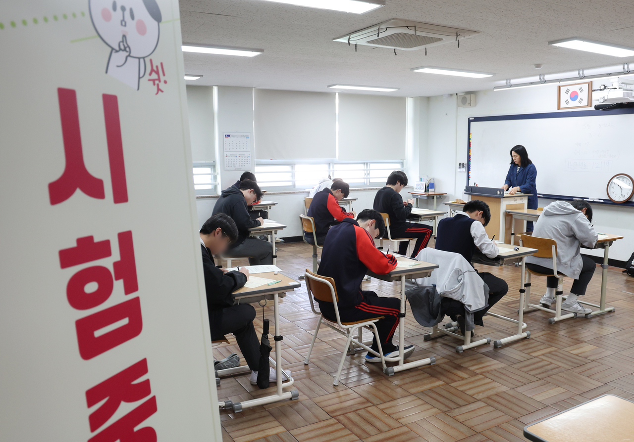 Senior students at the Busan High School in Busan are taking a mock exam in preparation for the 2026 college admission on March 26. (Yonhap)