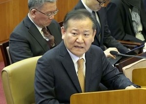 Ex-interior minister questioned overnight in martial law probe