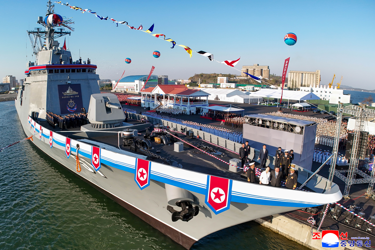 This photo, released by North Korea's state-run Korean Central News Agency, shows Pyongyang's new navy destroyer unveiled at a launching ceremony held at a shipyard in the North's western port city of Nampho Shipyard on Friday (Yonhap)