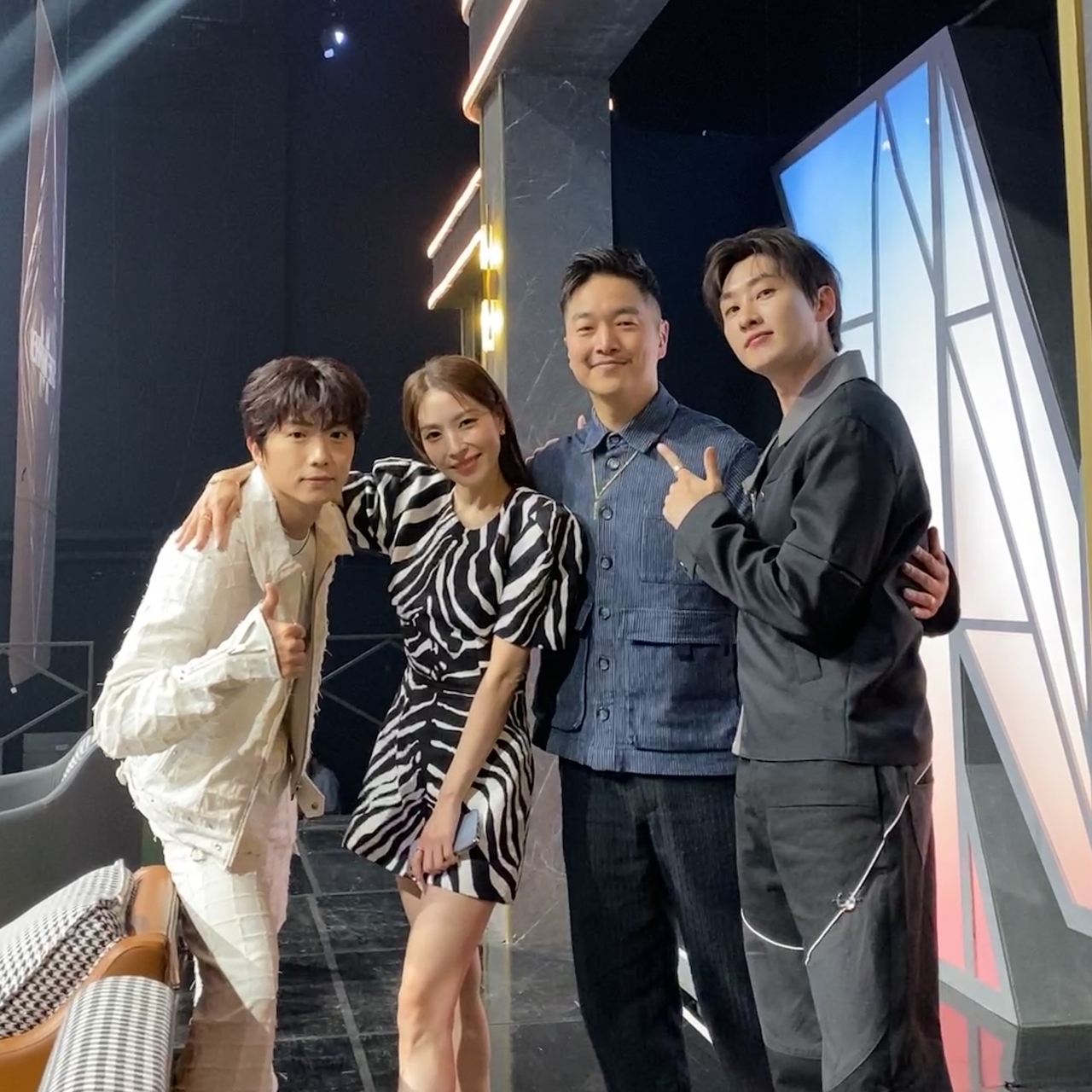 Song (second from right) with celebrity judges Wooyoung of 2PM (left), BoA (second from left) and Eunhyuk of Super Junior (right) during Mnet's all-male dance show "Street Man Fighter" in 2022. (Courtesy of Song)