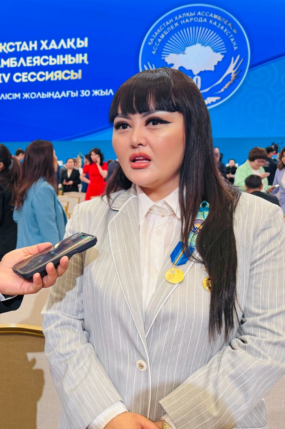 An Yelena, chair of the Korean Association in the Gizirotan Region, interacts with The Korea Herald on the sidelines of the 34th session of the Assembly of the People of Kazakhstan at the Palace of Independence in Astana, the capital of Kazakhstan, on Thursday. (Sanjay Kumar/ The Korea Herald)
