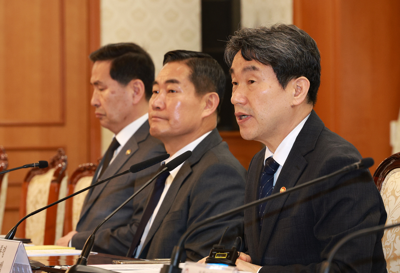 Acting President and Deputy Prime Minister Lee Ju-ho (far right) speaks during an emergency meeting of the National Security Council at the Seoul Government Complex on Friday. (Pool photo via Yonhap)