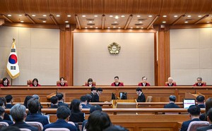 Acting president appoints 9th justice to Constitutional Court